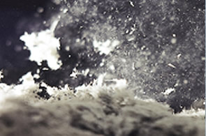 Image close up of loose-fill asbestos fibres in the air