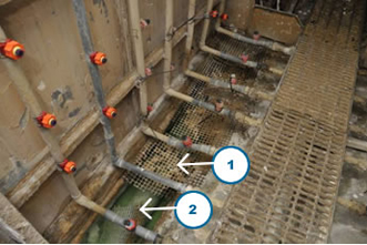 Figure 5 - Floor of tunnel showing scale build-up