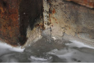 Figure 6 - View of internal surface of tank showing rust and limescale