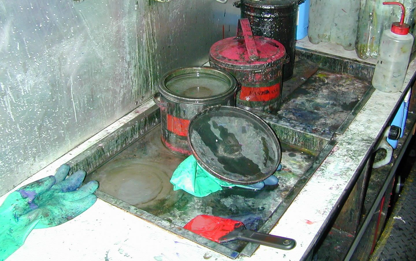 Gloves left in sink with chemicals