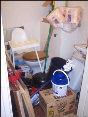 A very congested storeroom which is unsuitable for purpose