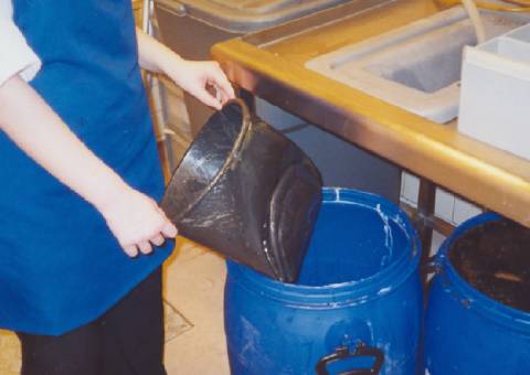 the melted bucket and blue collection barrel