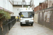 Bin truck in narrow entry